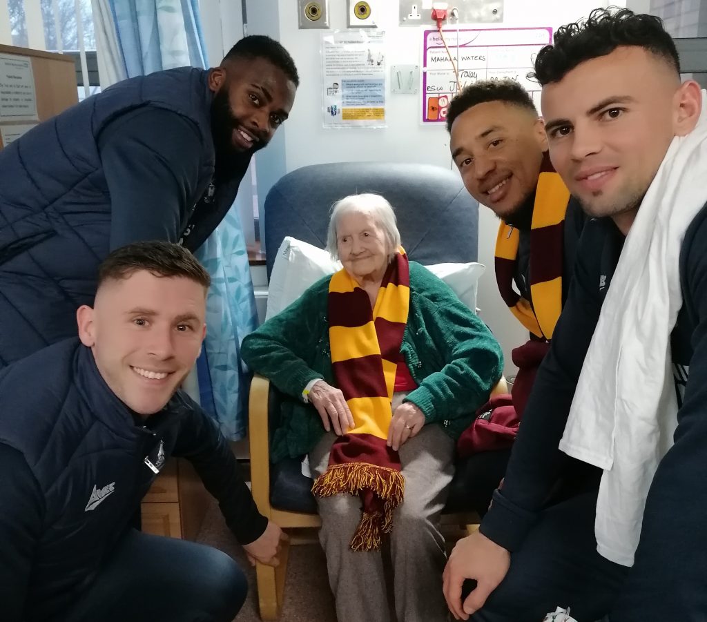 City players prove a hit with 104-year-old May during Christmas visit