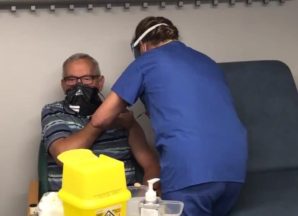 Retired engineer, 85, among first to receive COVID-19 vaccine in Bradford