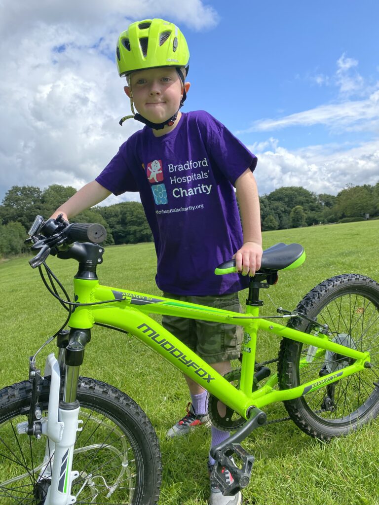 Alex uses pedal power to raise money for children in hospital